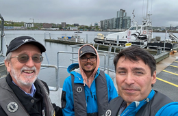Derrick Peyton, CEO of IIC Technologies, and team on the dock in Canada, marking the Arctic partnership with Sedna ROV Services and Leeway Marine to strengthen hydrographic survey capacity in Canada.